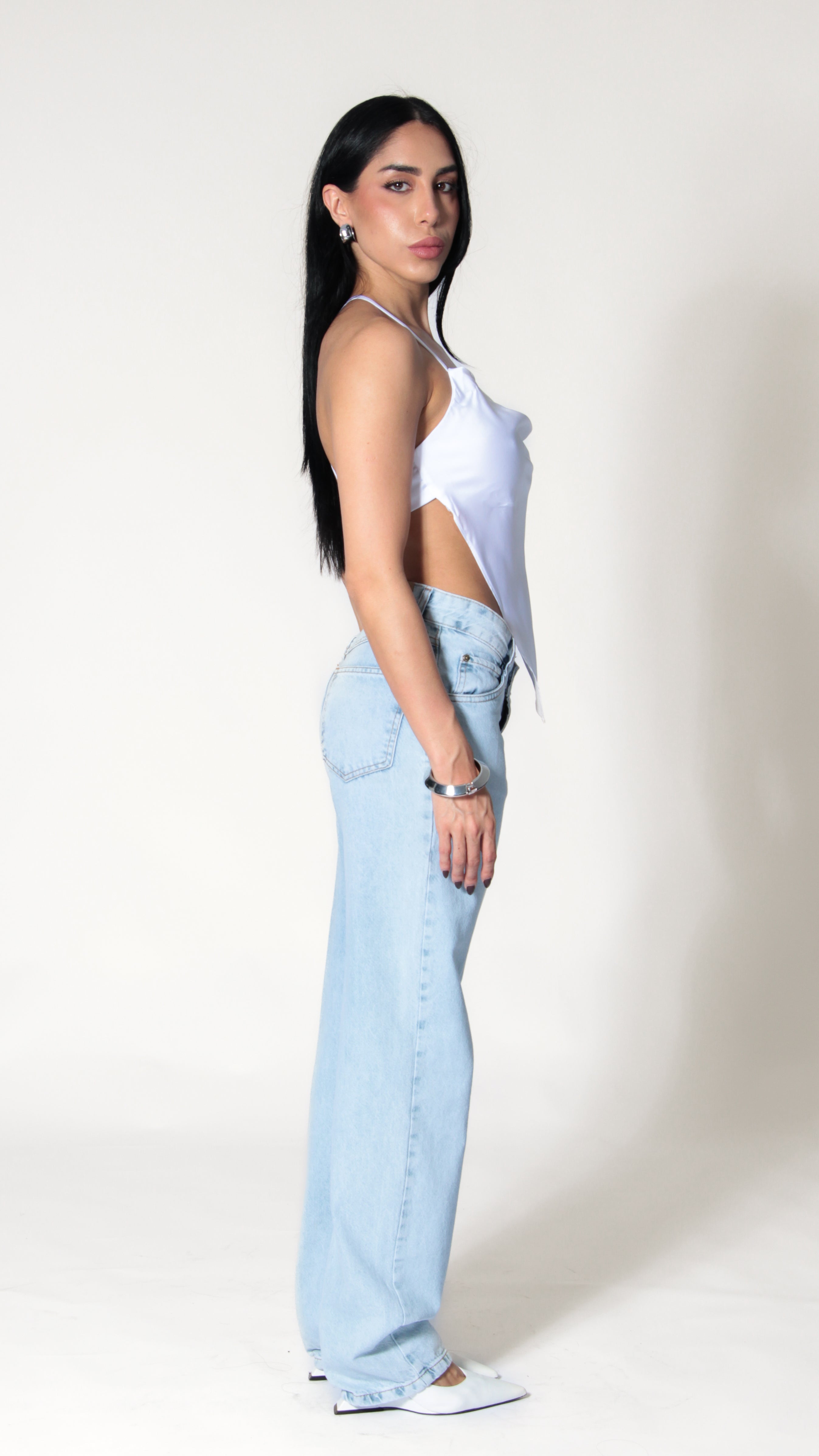 CALÇA JEANS ASSIMÉTRICA