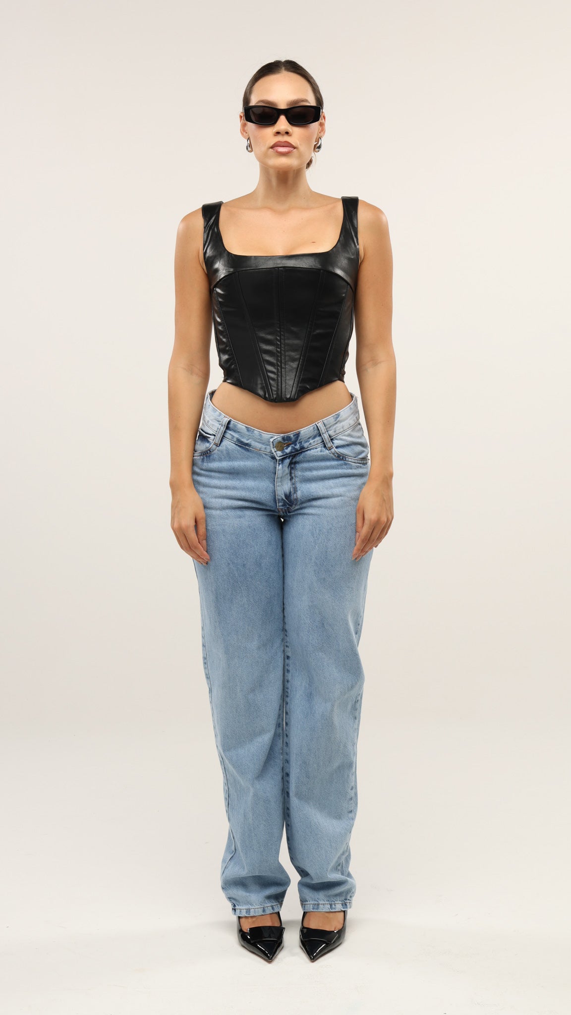 CALÇA JEANS ASSIMÉTRICA